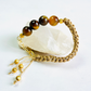 Bold Tiger Eye Rakhi – 12mm Beads for Strength & Protection