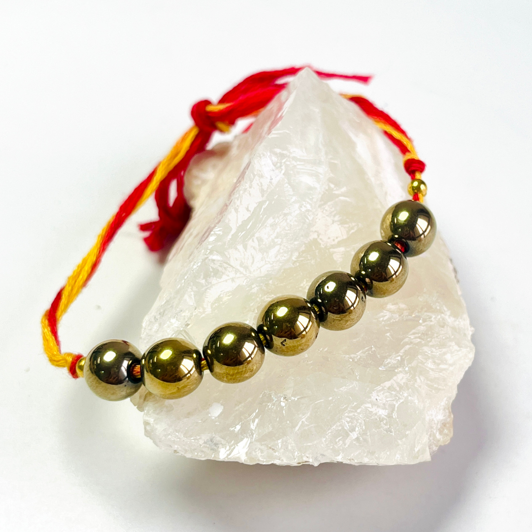 Golden Pyrite Crystal Rakhi – Protection, Abundance & Strength for Brothers