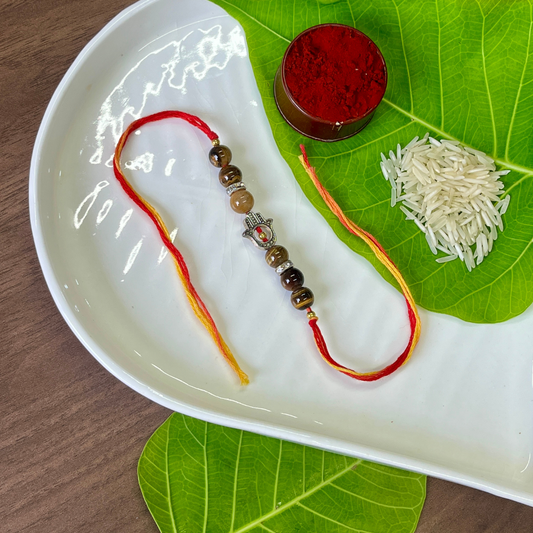 Tiger Eye Rakhi with Hamsa Charm – Protection & Power